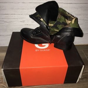 Black combat boots with camo inside. Size 8